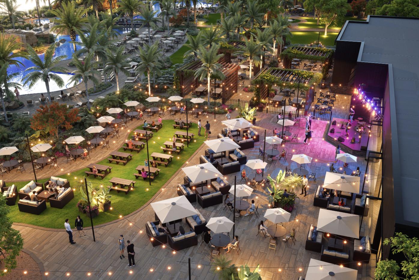 Evening aerial view of the Kingston South courtyard with dining, lounge seating and live music